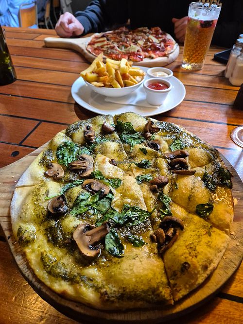 Bannockburn vegan pizza and fries with vegan aoli and tomato sauce at Vogel St Kitchen in Dunedin