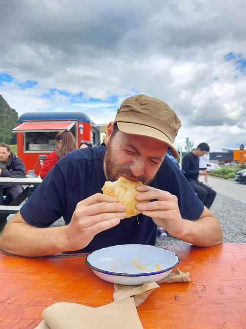 Santi eating vegan at Stoked Local Sangucheria  in Wanaka