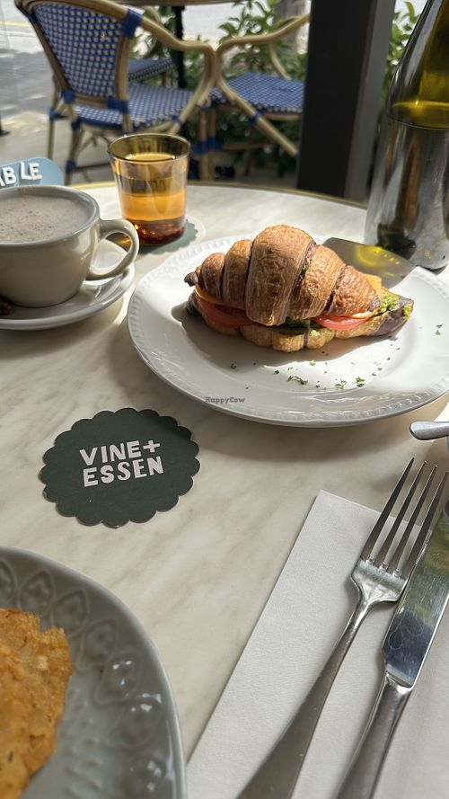 Vegan croissant with broccolini pesto, sliced tomato and vegan cheese.  at Vine + Essen in Hahndorf