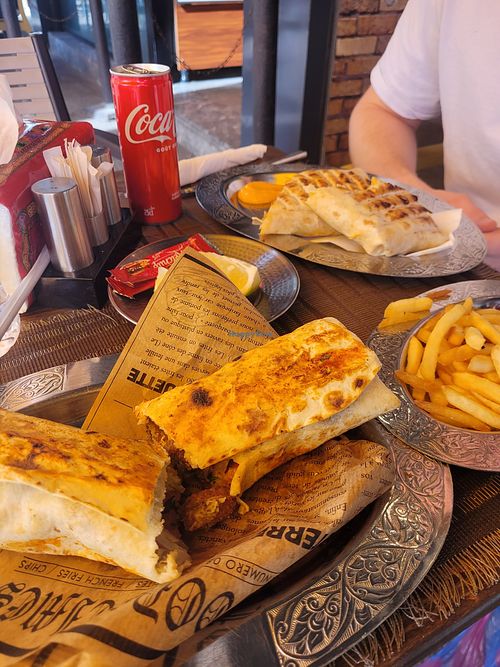 Falafel Wrap with fresh salad inside, hummous and chips at Nali Restaurant in Agadir
