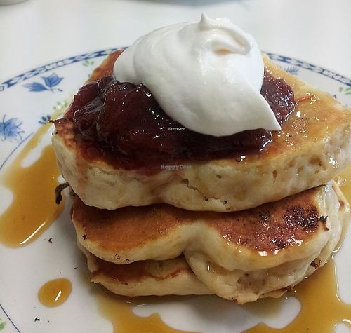 Vegan white chocolate pancakes with soy cream, rhubarb compote and maple syrup. Part of the weekend breakfast menu at Pearfect Pantry: they generally have vegan pancakes, but the flavours will vary. at The Pearfect Pantry in Osbourne Park