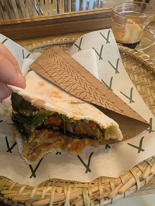 Tapioca with hummus tahini, sundried tomatoes, marinated red onion and rocket. Sorry, I started eating it before photographing it! at Tapí Tapioca - Loja Centro  in Rio De Janeiro