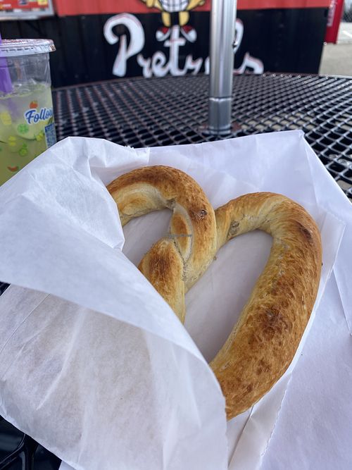 Fresh Pretzel Enjoyed in the Shade w/Cucumber Aguga Fresca from Another Food Stall (Super Recommend BOTH)  at Twisties Pretzels in Modesto