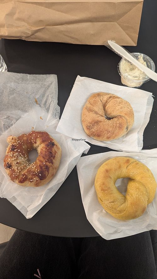 Teriyaki, chocolate, and pumpkin with a side of tofu cream cheese (total $16 CAD) at WA - Bagel in Vancouver