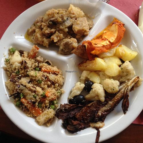 veggie cous cous, roasted cabbages with black olives, seitan with portobello mushrooms, roasted pumpkin and potatoes, grilled radicchio  at Basilico in Rovigo
