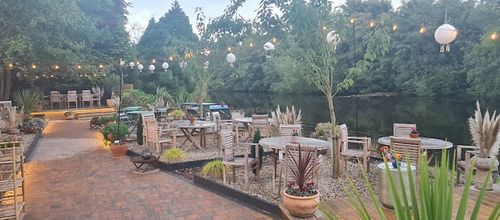 Outdoor seating by the river  at Waterside  in Whitby