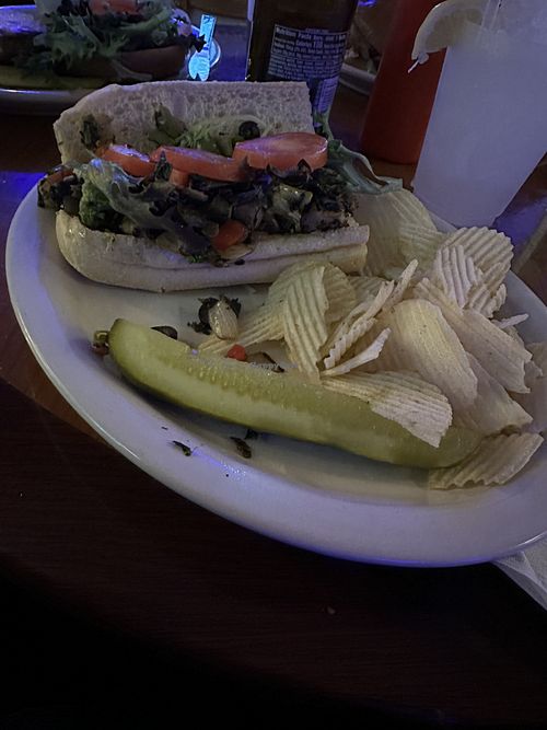 Greek Veggie Sub with chipss  at Cellar Restaurant & 6-Pak Store in Blacksburg