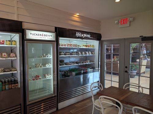 Second fridge and doors to hotel at Tucker and Bevvy in Honolulu