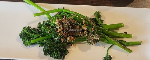 Wood fired broccolini without parm and prosciutto. This looks much smaller than it was. The stems were 8+ inches long. Loved the char from the wood fire! at Bavaro's Pizza in St Petersburg