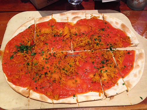 Flammkuchen - pumpkin, oregano and tomato sauce - vegan option - amazing! at TIAN Bistro Kunsthaus in Vienna