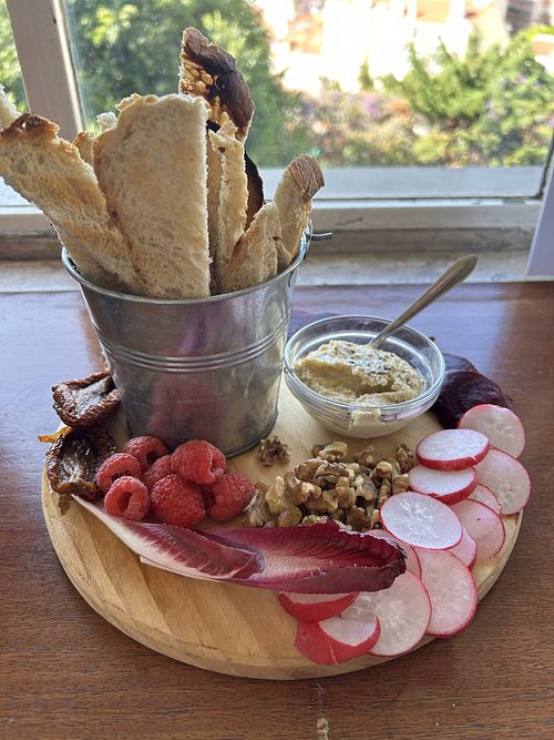 Hummus fruit & veg plate  at Café Da Garagem in Lisbon