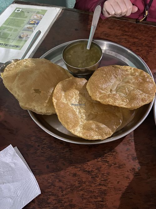 Greasy puri tarkari   at Arghakhanchi Vegetarian Restaurant in Pokhara