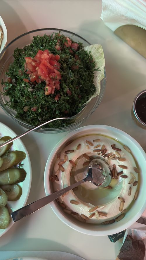 Hummus with pine nuts and tabbouleh   at Caracas in Giza