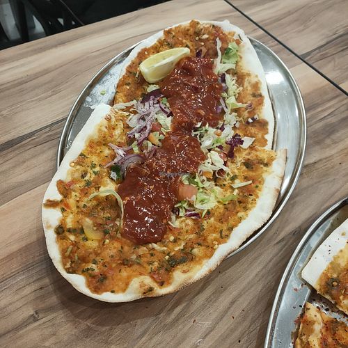 Vegan lahmacun (with salad and hot sauce) at kral URFA LAHMACUN pide in Cologne