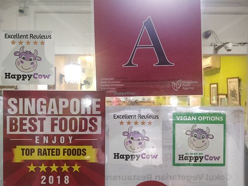 HappyCow 5 stars EXCELLENT reviews decal at Gokul Raas Vegetarian - Little India in Central Singapore