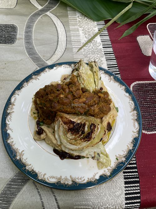 Seared cabbage with bean stew, delicious   at Vegan Riverside Picnic with Chef Vita in Ocho Rios