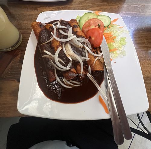 Enmoladas de frijoles (no tiene caldo de pollo el mole)   at La Placita Restaurante in Zamora
