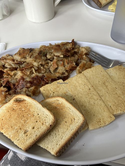Grilled tofu breakfast with hashbrowns and sourdough toast.   at Pancakes Plus  in Nanuet