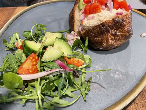 Jacket potato with hummus    at Market Street Bakery in Crewkerne