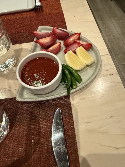 Pepper plate with house hot saucee  at Kismet Modern Indian  in Richmond