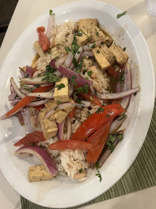 TACU TACU - Combination of rice and beans. Topped with Tofu Saltado  at Gabby's Peruvian Restaurant in Wichita
