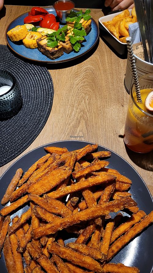 Grilled tofu+grilled veggies+potatoes+tomatoes sauce AND sweet potatoes at Holivudas in Taurage