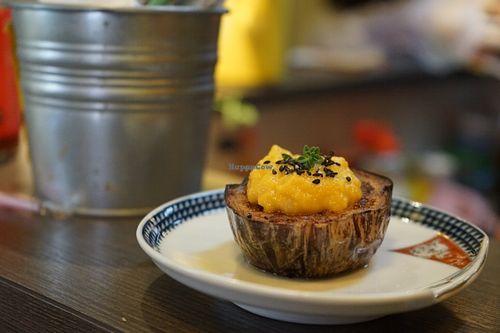 Zucchini "steak" with creamy garlic sauce.  at Base Island Kitchen in Osaka