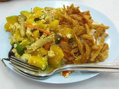 Plate of rice with two toppings. This particular topping has pumpkin and mushroom, and i never see this in other Jay restaurants in Udon Thani. at Jay - City Center in Udon Thani