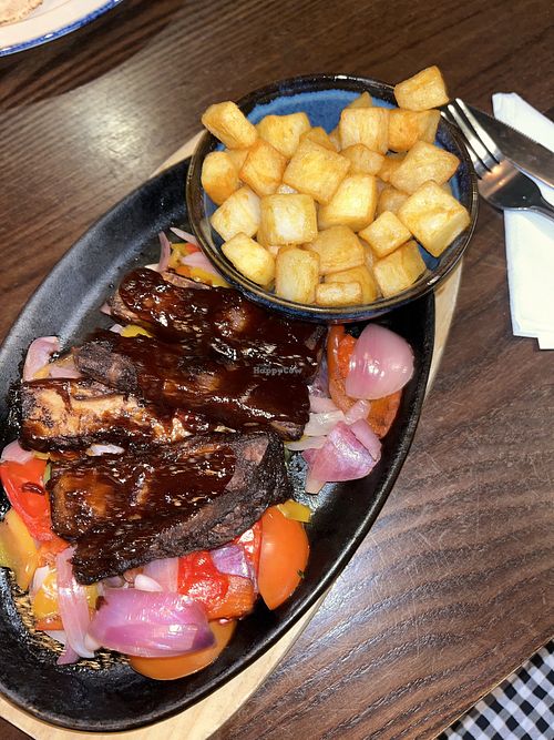 Sizzling vegan ribs with barbecue sauce, roasted veg and diced potatoes   at The Clay Pipe Inn  in Poole