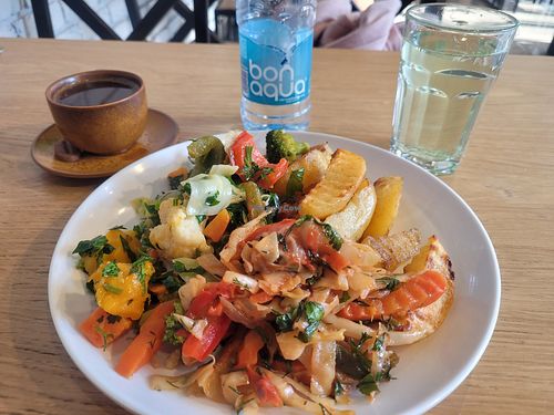 This whole lot—massive plate of fresh, delicious food a coffee, a water, and a cordial from a local plant—only cost 1800 AMD ($7.40 AUD). Great value. at Art Lunch in Yerevan