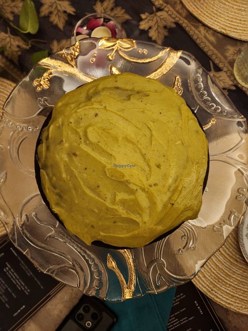 Dark chocolate, coffee, olive oil cake with pistachio icing at Around The Table - Supper Club in Mumbai