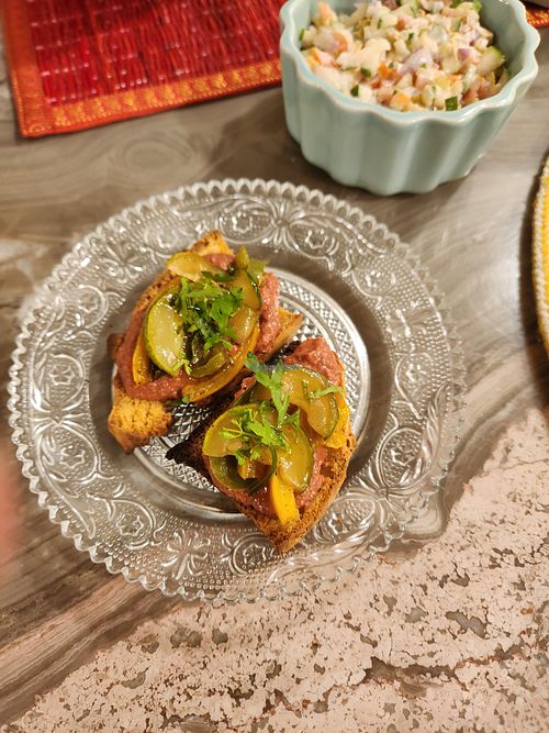 Crostini with homemade soda bread, muhammara and satueed veggies at Around The Table - Supper Club in Mumbai