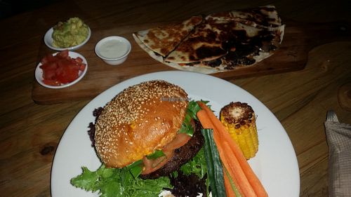 Burger and a enchilada. Both portions very small.  at Plant in Cape Town