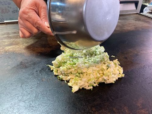 Step1 Mix okonomiyaki batter and vegetables at Okonomiyaki FUJI in Takehara