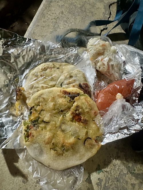 Tomato sauce and cabbage all veggie pupusass  at Pupusería La Ceiba in Santa Ana