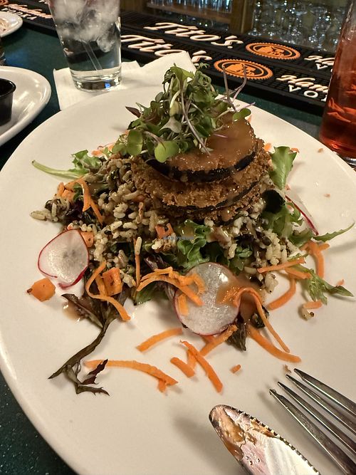 Crusted eggplant over grains and salad with a balsamic sauce   at Big Tree Inn  in Geneseo