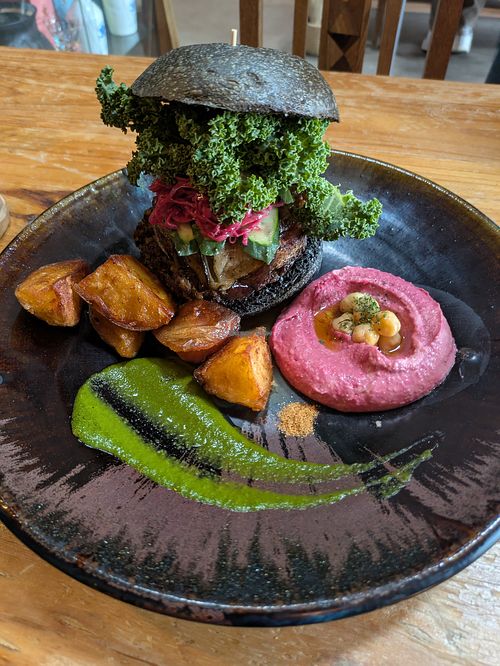 Vegan burger, fries and hummus dip at SUNPEDAL in Tokyo