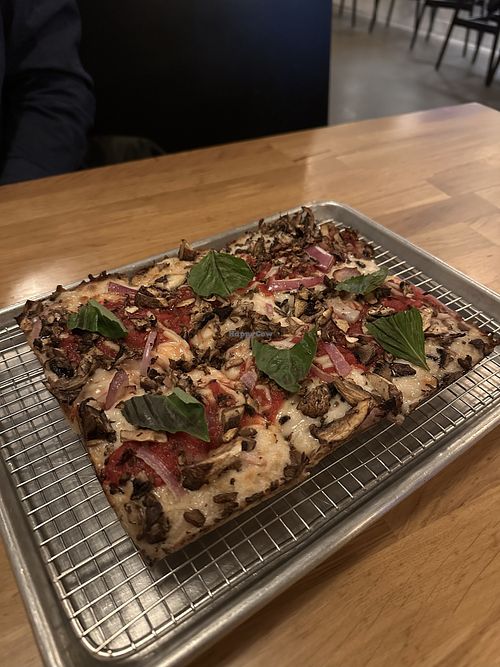 Build your own Detroit style pizza with vegan cheese, mushrooms, red onions, and basil😄  at Emmy Squared Pizza in Louisville