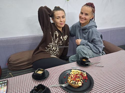 Customers having vegan food at Rama Cafe in Rishikesh