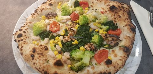 Pizza chef's fantasy at Pizzeria Da Spetic in Trieste