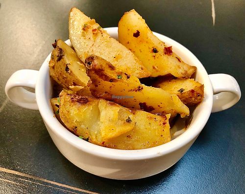 Spiced roasted potatoes  at Olive Tree Restaurant in Dubai
