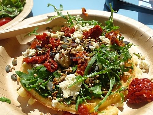 Med Vibes waffle: fresh pesto, sundried tomatoes, rocket, homemade almond feta, toasted seeds (GF) at All Good Things Vegan in Paignton