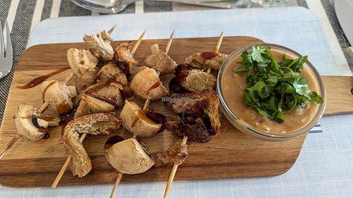 Vegan chicken and mushroom skewers with satay sauce (starter) at All Good Things Vegan in Paignton