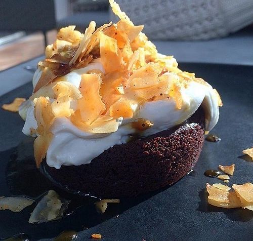 The best for last! The fudge brownie was really amazing!!! It had salted Mezcal caramel sauce drizzled on top, with coconut bacon and orange cashew whipped cream  at Gracias Madre - WeHo in West Hollywood