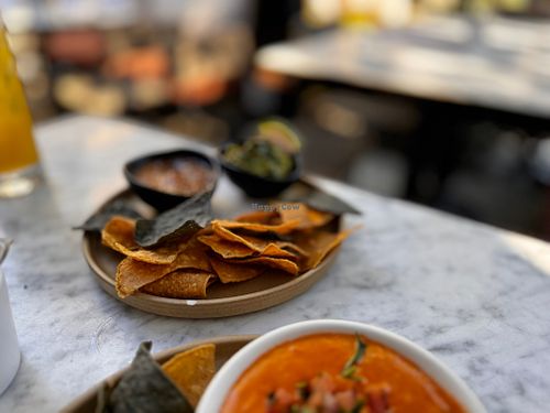 Starter, the Queso is warm with incredible flavors, and no Mexican meat is complete without Chips and Salsa  at Gracias Madre - WeHo in West Hollywood