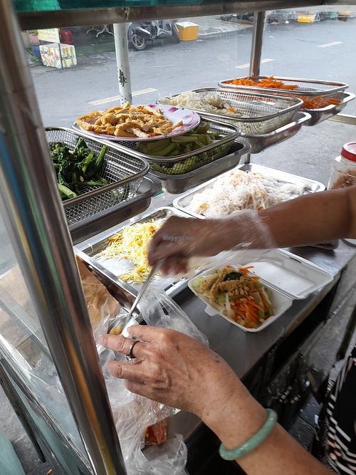 Packing my food at Bun Mi Xao Chay in Ho Chi Minh City