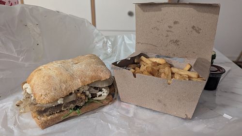 Milanesa fugazzetta con papas fritas ($7200) at Mila y Vos in Buenos Aires