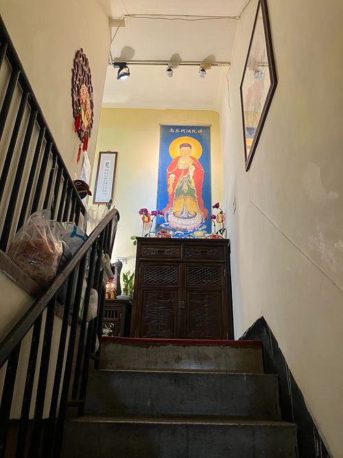 At the top of the stairs at Shifangyuan Healthy Vegetarian Food - 十方緣養生素食 in Taipei