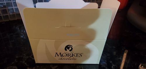 Box is an extra charge at Morkes Chocolates Cedar Lake in Cedar Lake