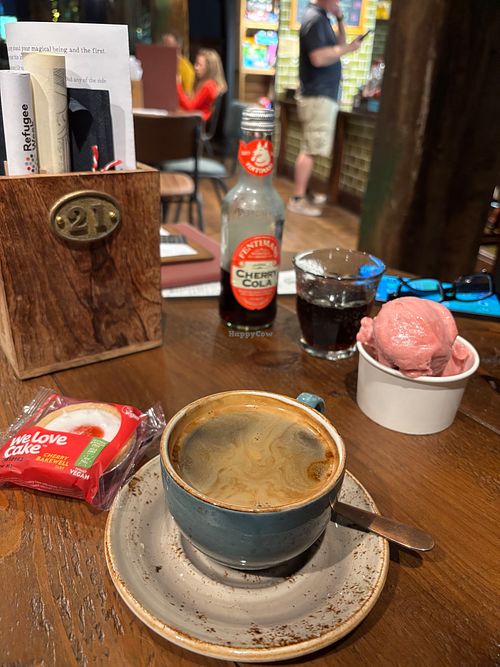vegan Cherry Bakewell and americano, and raspberry sorbet (two scoops) and Fentimans Cherry Cola at Emporium Stories Feastery in Rotherham